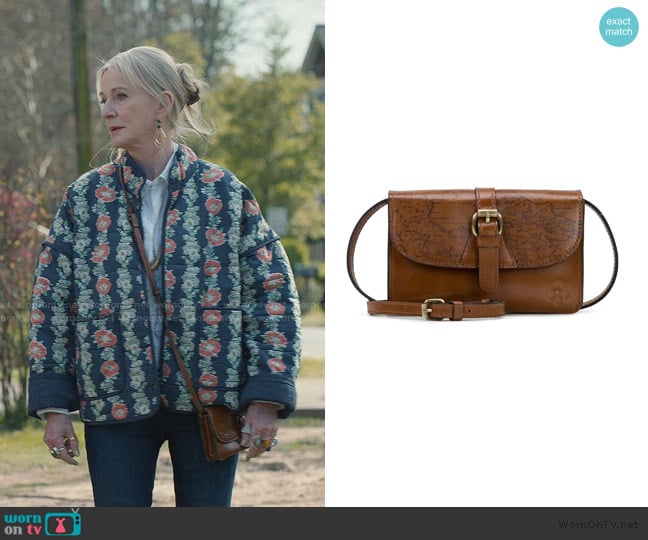 Patricia Nash Torri Map Crossbody Bag worn by Paula (Caroline Lagerfelt) on Sweet Magnolias