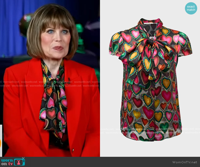 Alice + Olivia Jeannie Bow Cap-Sleeve Burnout Blouse in Love Ease worn by Nancy Brown on Good Morning America