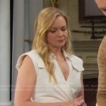 Belle’s white padded shoulder wrap dress on Days of our Lives