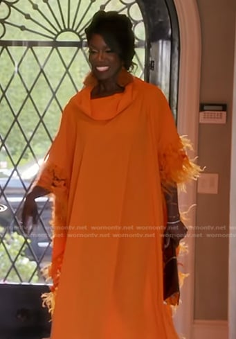 Bozoma's orange feather trim kaftan dress on The Real Housewives of Beverly Hills