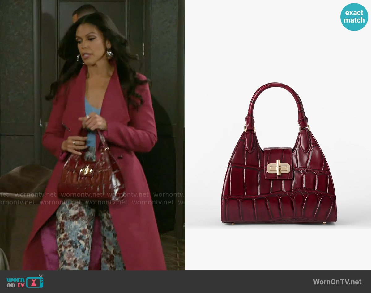 Brahmin Adrian Bag in Merlot Nerina worn by Dani Dupree (Karla Mosley) on Beyond the Gates