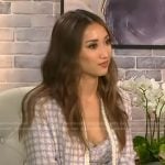 Brenda Song’s tweed jacket and mini skirt on Access Hollywood