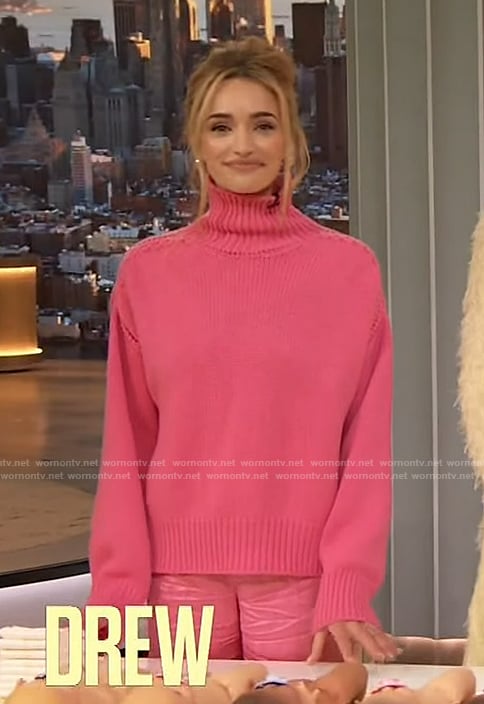 Brianne Howey’s pink turtleneck sweater and pants on The Drew Barrymore Show