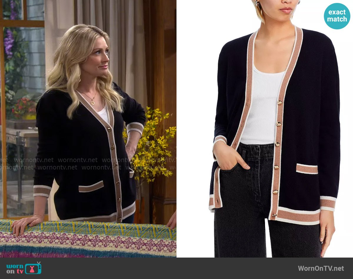 Gemma’s black cardigan with camel stripe trim on The Neighborhood