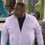 Calvin’s grey zip up jacket on The Neighborhood