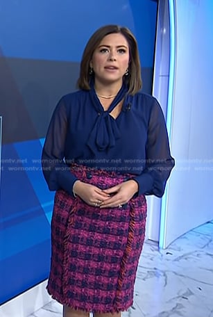 Chloe's blue tie neck blouse and pink tweed skirt on Today