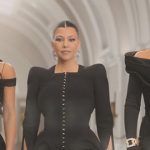 Kourtney’s black puff sleeve jacket on The Kardashians