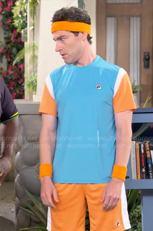 Dave’s turquoise and orange colorblock t-shirt and shorts set on The Neighborhood