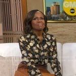 Deborah's black floral blouse and brown ombre pleated skirt on Good Morning America
