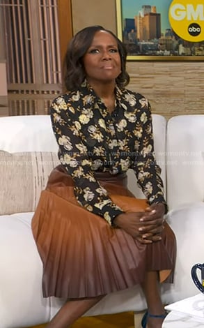 Deborah's black floral blouse and brown ombre pleated skirt on Good Morning America