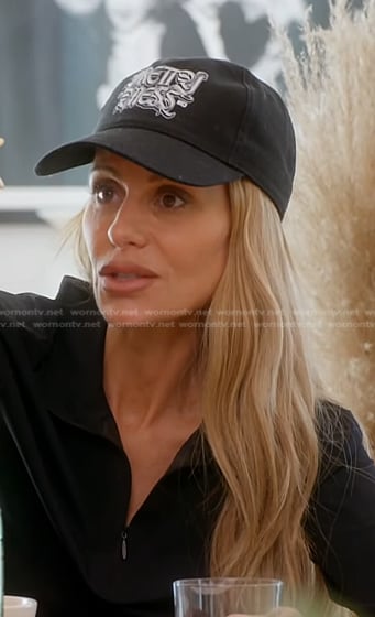 Dorit’s black print baseball cap on The Real Housewives of Beverly Hills