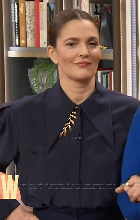 Drew's navy blouse and pants on The Drew Barrymore Show