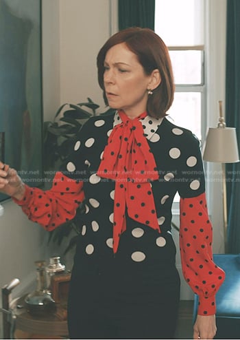 Elsbeth's polka dot collared sweater and tie neck blouse on Elsbeth