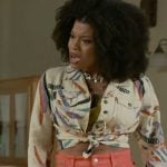 Eva’s feather print shirt and orange wide leg jeans on Beyond the Gates