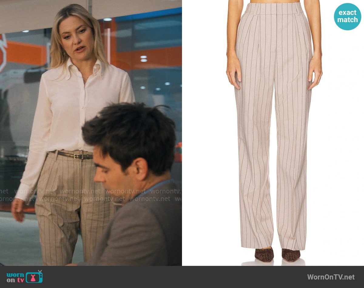 Isla’s grey pinstripe pants on Running Point