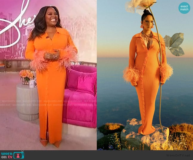 Sherri’s orange feather cuff dress on Sherri