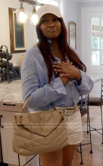 Garcelle's beige quilted bag on The Real Housewives of Beverly Hills