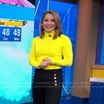 Ginger’s yellow turtleneck and black flare pants on Good Morning America