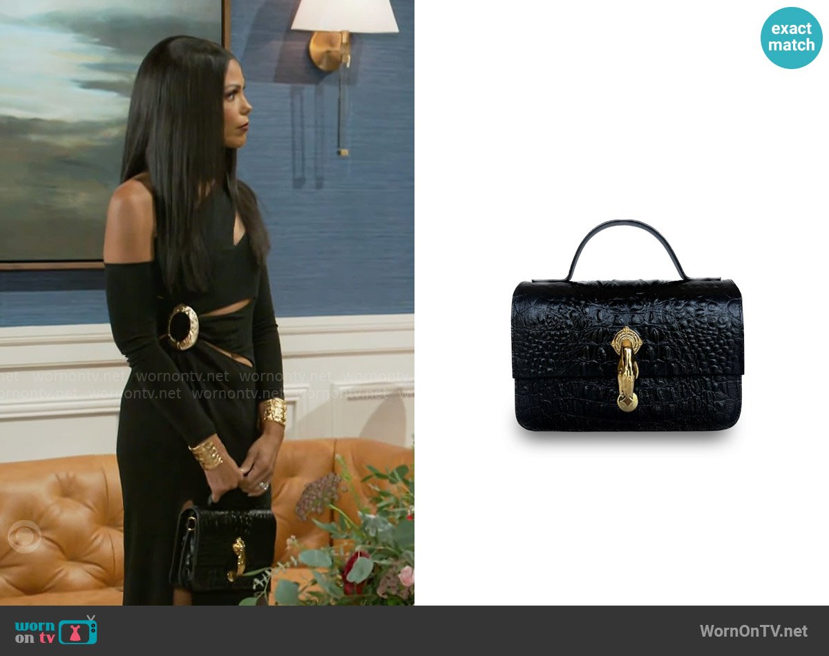 Indigolush Midi Classic Gl Black Bag worn by Dani Dupree (Karla Mosley) on Beyond the Gates