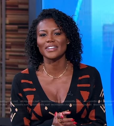 Janai’s black and orange print cardigan dress on Good Morning America