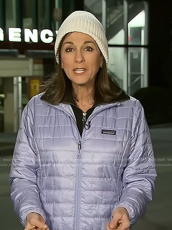 Janet Shamlian's lilac puffer jacket on CBS Evening News