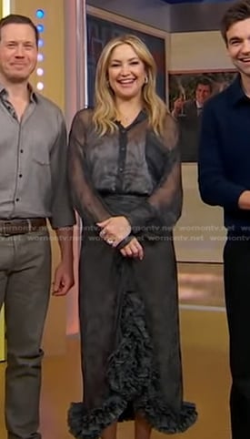 Kate Hudson's black print sheer blouse and ruffle trim skirt on Good Morning America