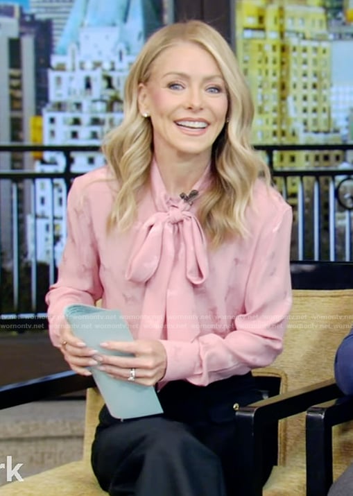 Kelly's pink tie neck blouse and jeans on Live with Kelly and Mark