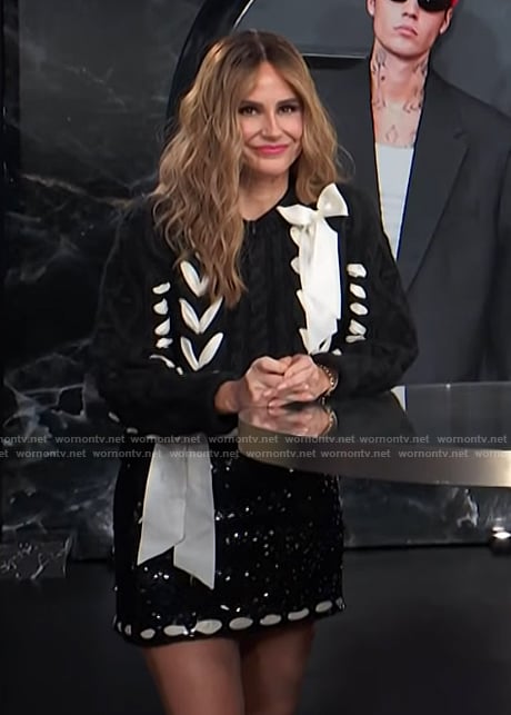 Keltie’s black embellished lace-up sweater and skirt on E! News