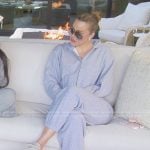 Khloe’s gray hoodie and sweatpants on The Kardashians