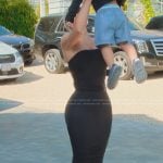 Kim’s black tube top and maxi skirt on The Kardashians