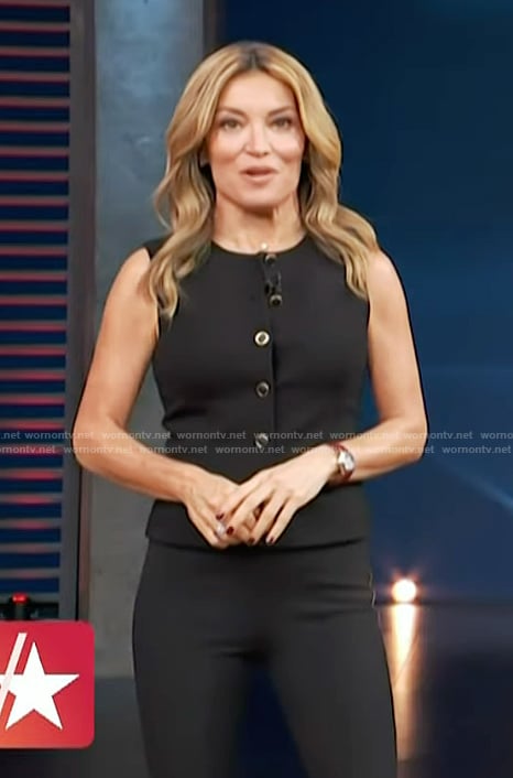 Kit’s black button front vest on Access Hollywood