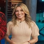 Kit’s beige cable knit sweater on Access Hollywood