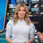 Kit’s blue puff sleeve top on Access Hollywood