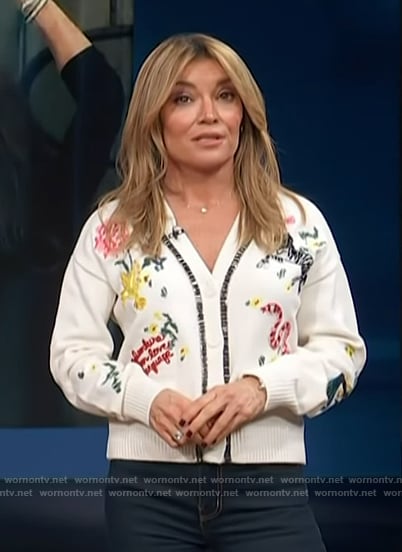 Kit's white animal embroidered cardigan on Access Hollywood