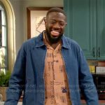 Malcolm’s orange printed shirt and denim jacket on The Neighborhood
