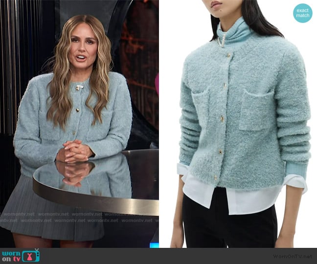 Keltie’s blue fuzzy cardigan on E! News