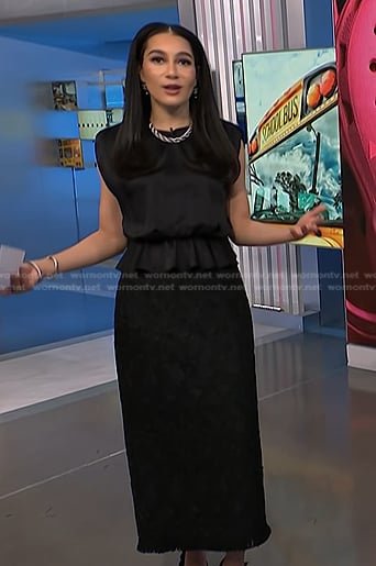 Morgan's black peplum top and lace pencil skirt on NBC News Daily