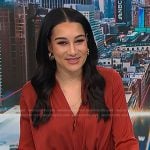 Morgan’s red v-neck blouse on NBC News Daily