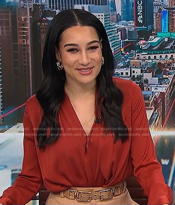 Morgan's red v-neck blouse on NBC News Daily