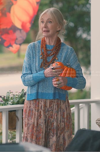 Paula's blue sweater and pink printed skirt on Sweet Magnolias