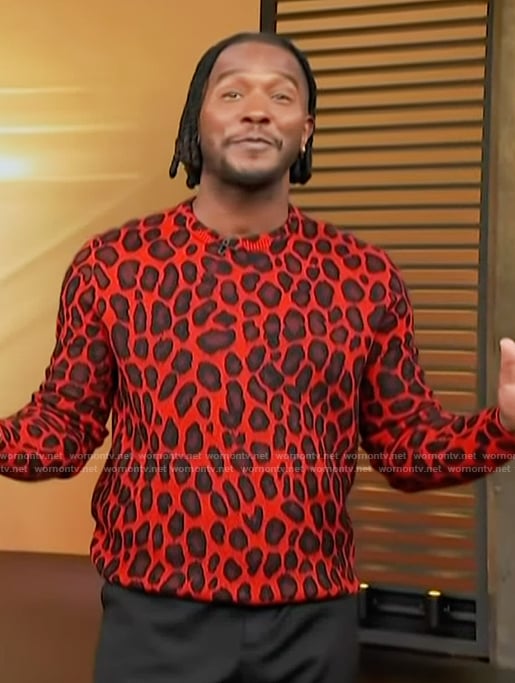 Scott’s red leopard print sweater by Alexander McQueen on Access Hollywood