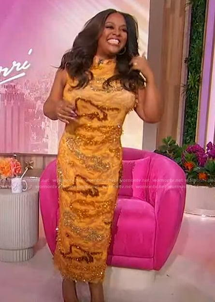 Sherris' orange embroidered sleeveless dress on Sherri