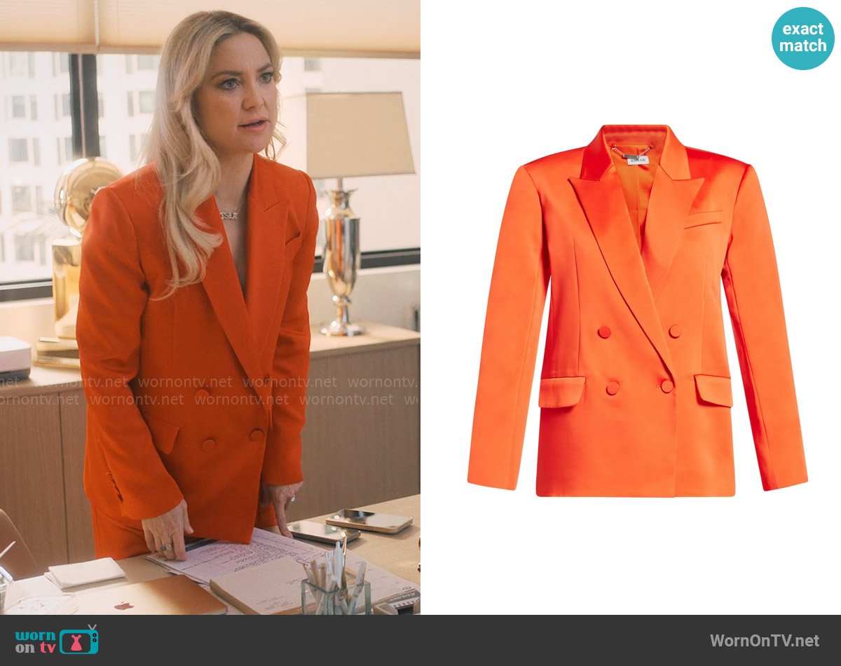 Isla’s orange satin blazer on Running Point