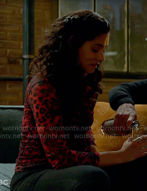 Stella's red leopard print top on Chicago Fire