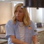 Sutton’s blue short sleeve patch shirt on The Real Housewives of Beverly Hills