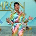 Tamron’s multicolored stripe blouse and pants on Tamron Hall Show