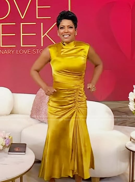 Tamron's gold satin ruched front dress on Tamron Hall Show