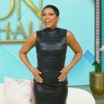 Tamron’s black croc skin effect top and skirt on Tamron Hall Show