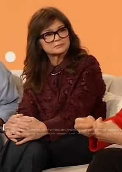 Valerie Bertinelli's burgundy lace blouse on The Drew Barrymore Show