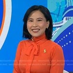 Vicky’s orange tie neck knit top on Today